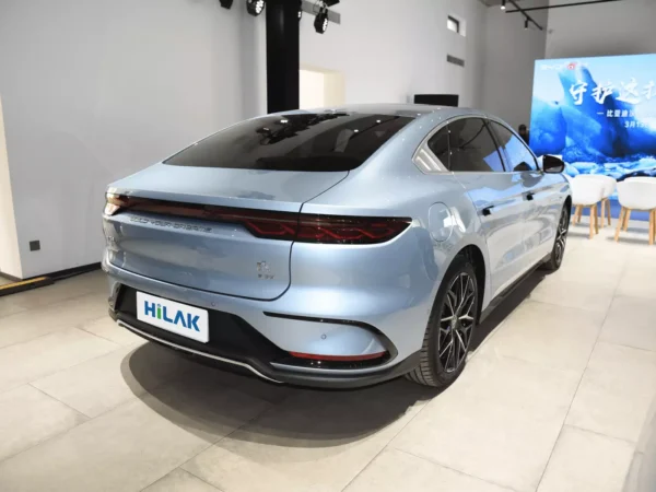 Right rear view of the light blue BYD Han electric car.