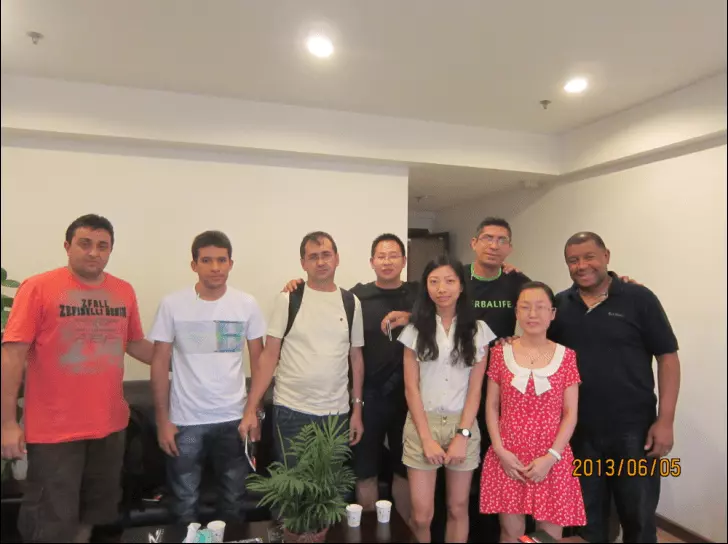 A group photo with our clients in the meeting room.