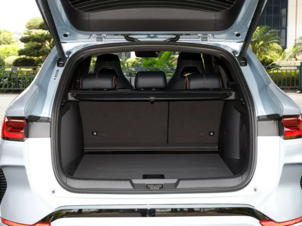 A close-up picture of the trunk of a BYD Song Plus electric car with a black interior and a lot of space.