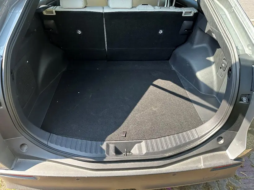 The trunk of a silver Toyota BZ4X electric car