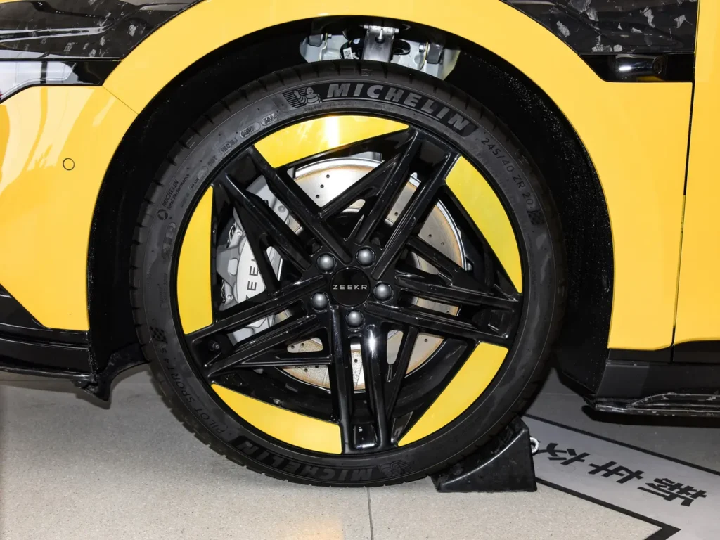 A Michelin tire of yellow Zeekr 007 electric car