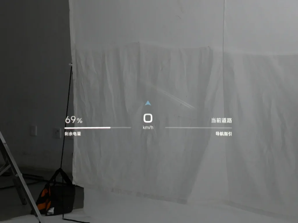 A heads-up display showing remaining battery, speed and navigation of Xiaomi SU7 electric car