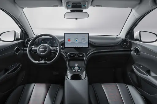 BYD e2 Honor Edition interior with sporty black-red design featuring 10.1-inch rotating touchscreen and digital instrument panel